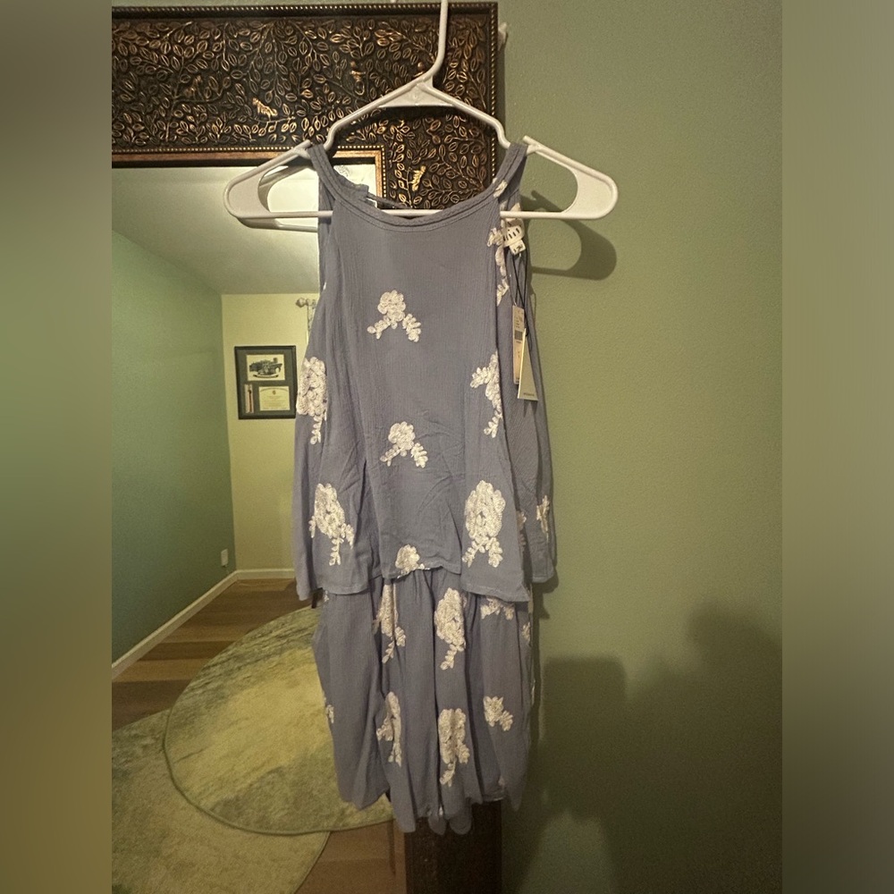 New with tags Anthropologie romper. Open back.